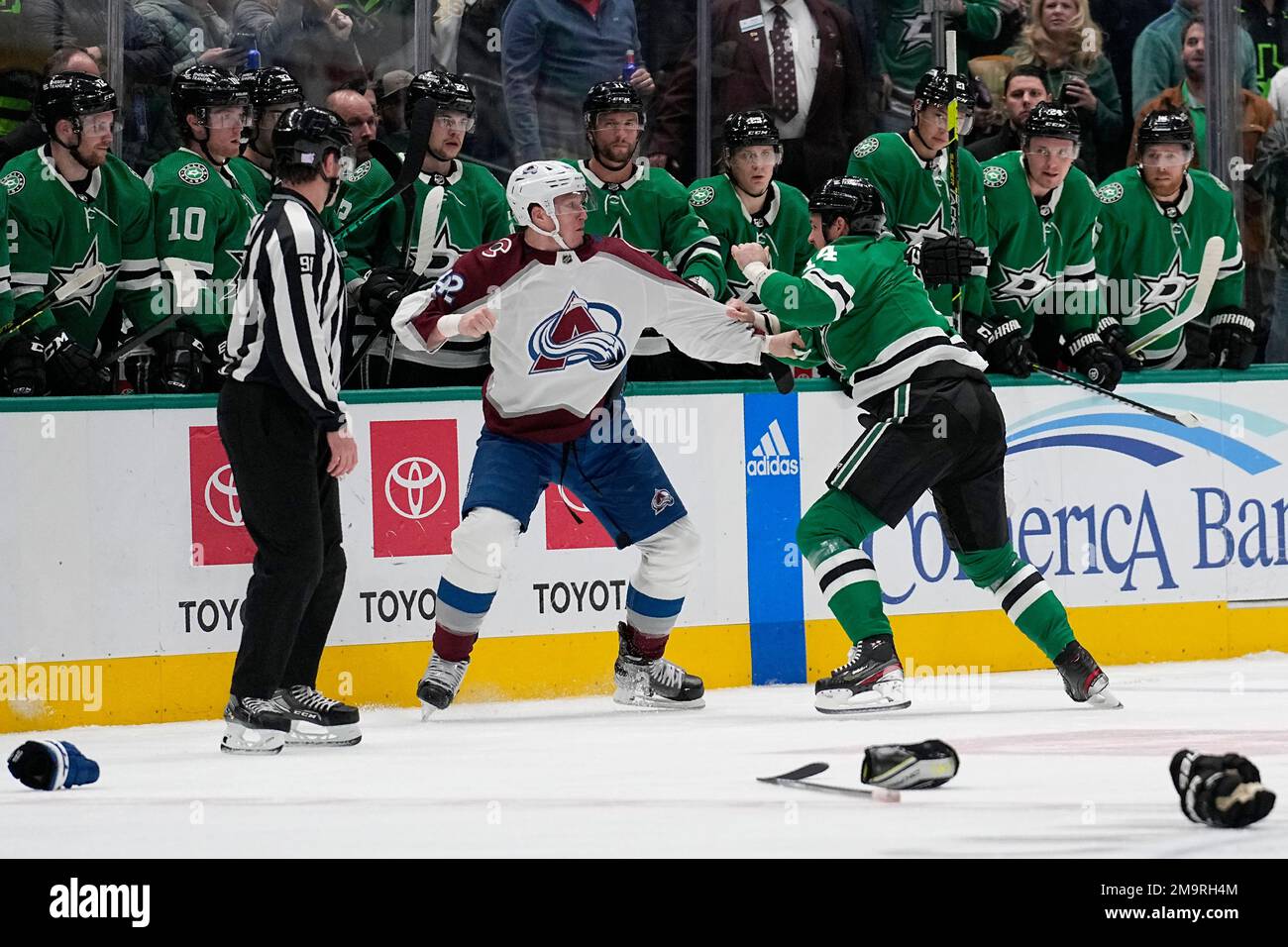 Colorado Avalanche defenseman Josh Manson, left, and Dallas Stars left