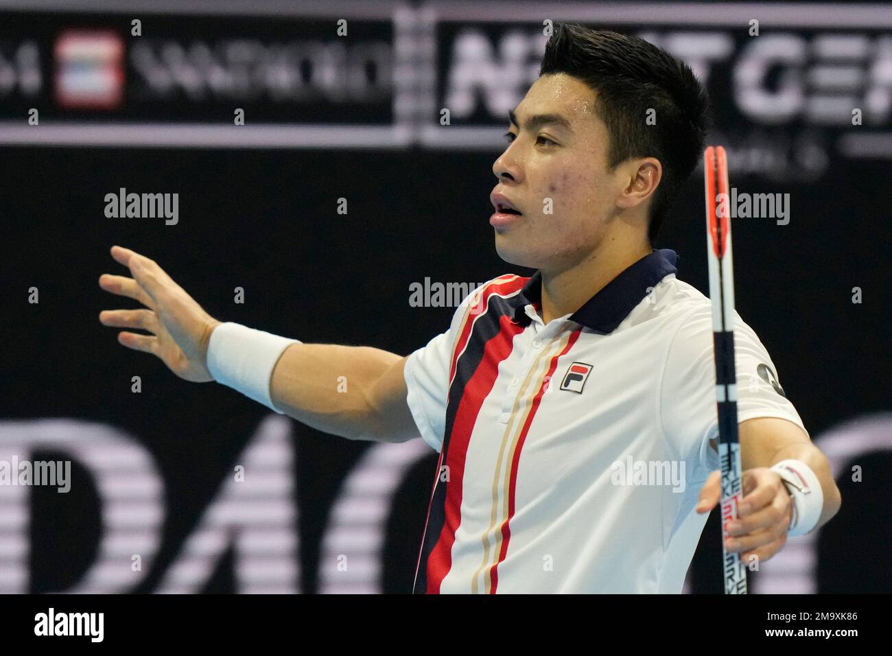 Winner United States' Brandon Nakashima celebrates after the final