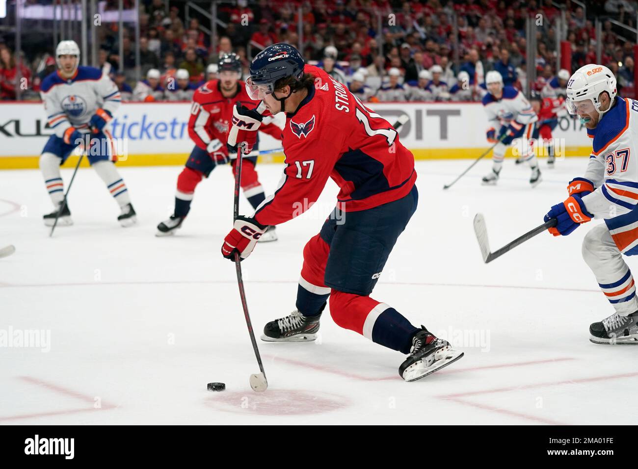 Washington Capitals center Dylan Strome (17) shoots a goal in the first