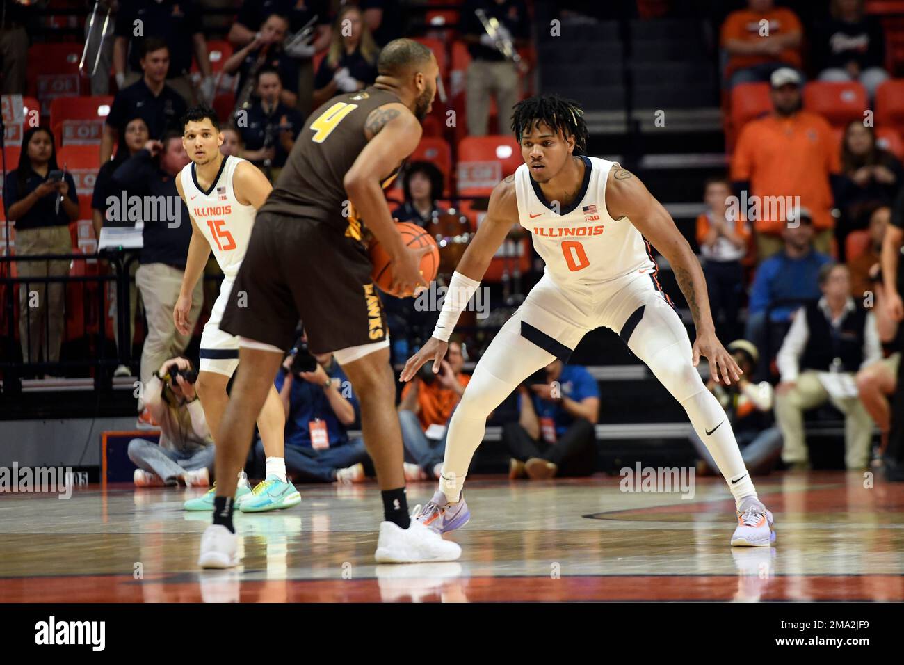 Illinois' Terrence Shannon Jr. (0) defends as Quincy's Jamaurie Coakley