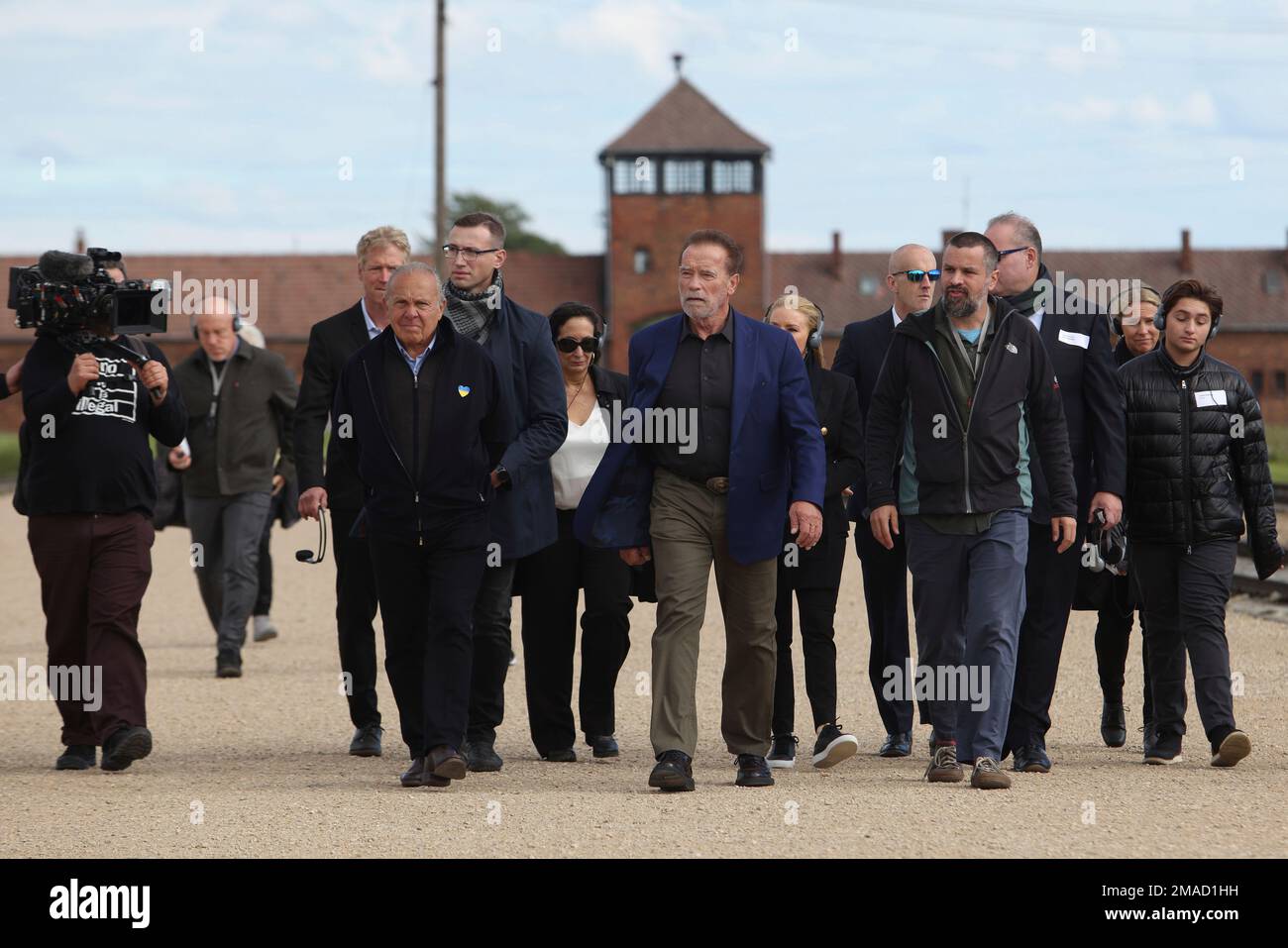 Arnold Schwarzenegger, center, and Simon Bergson, chairman of The ...