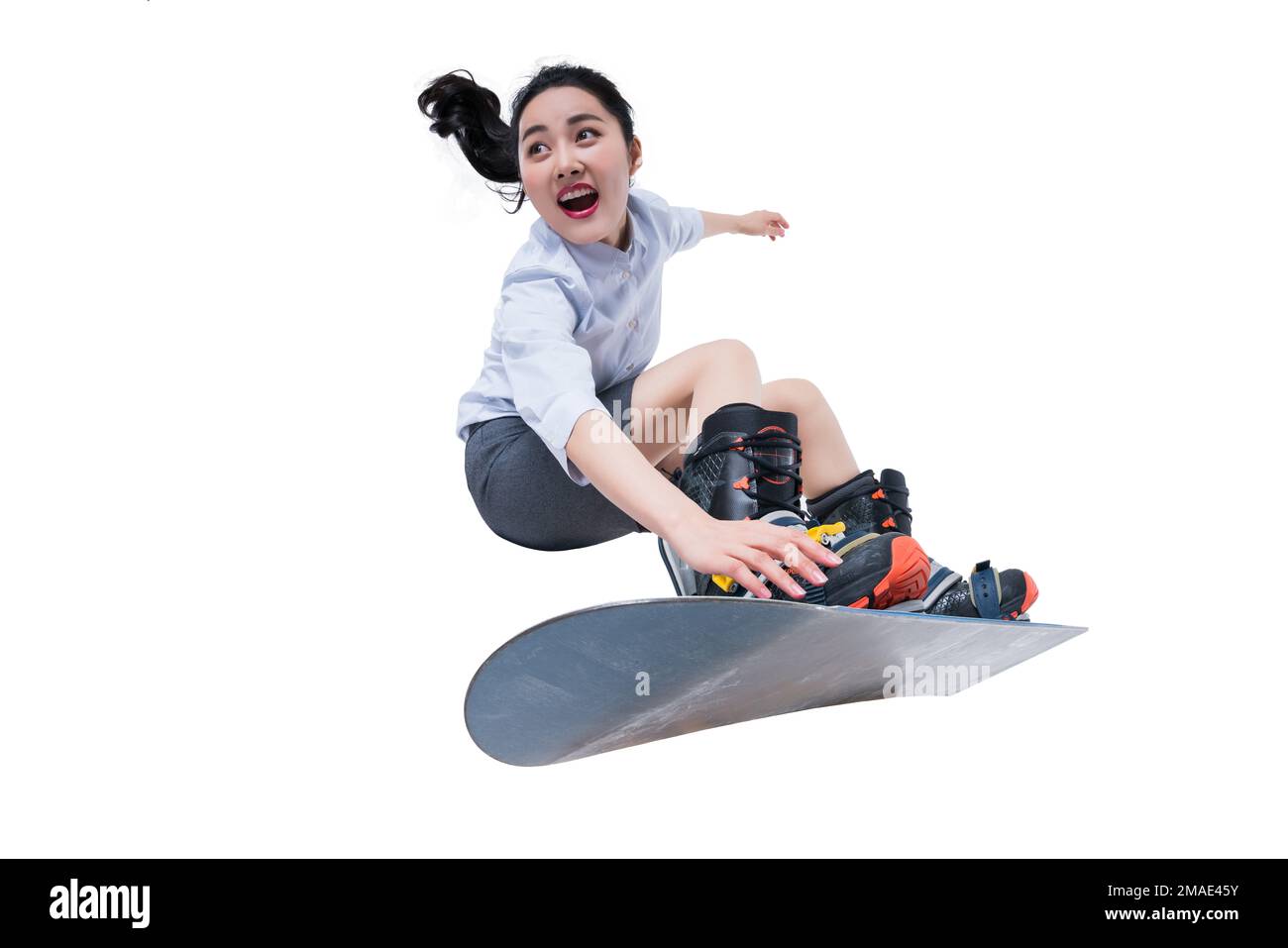 Eine junge Geschäftsfrau zum Skifahren Stockfoto