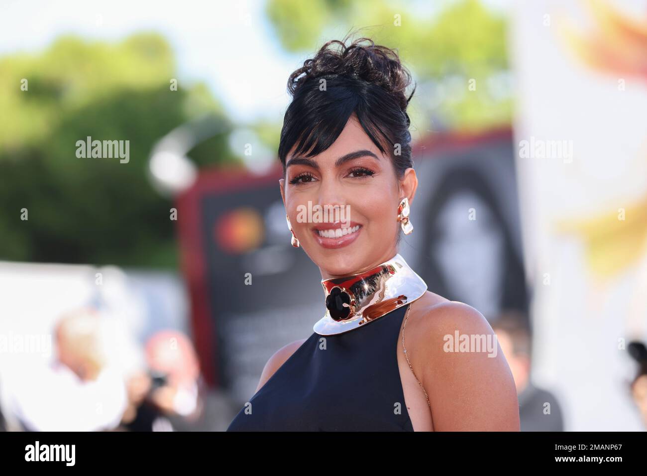 Rodriguez poses for photographers upon arrival at the premiere