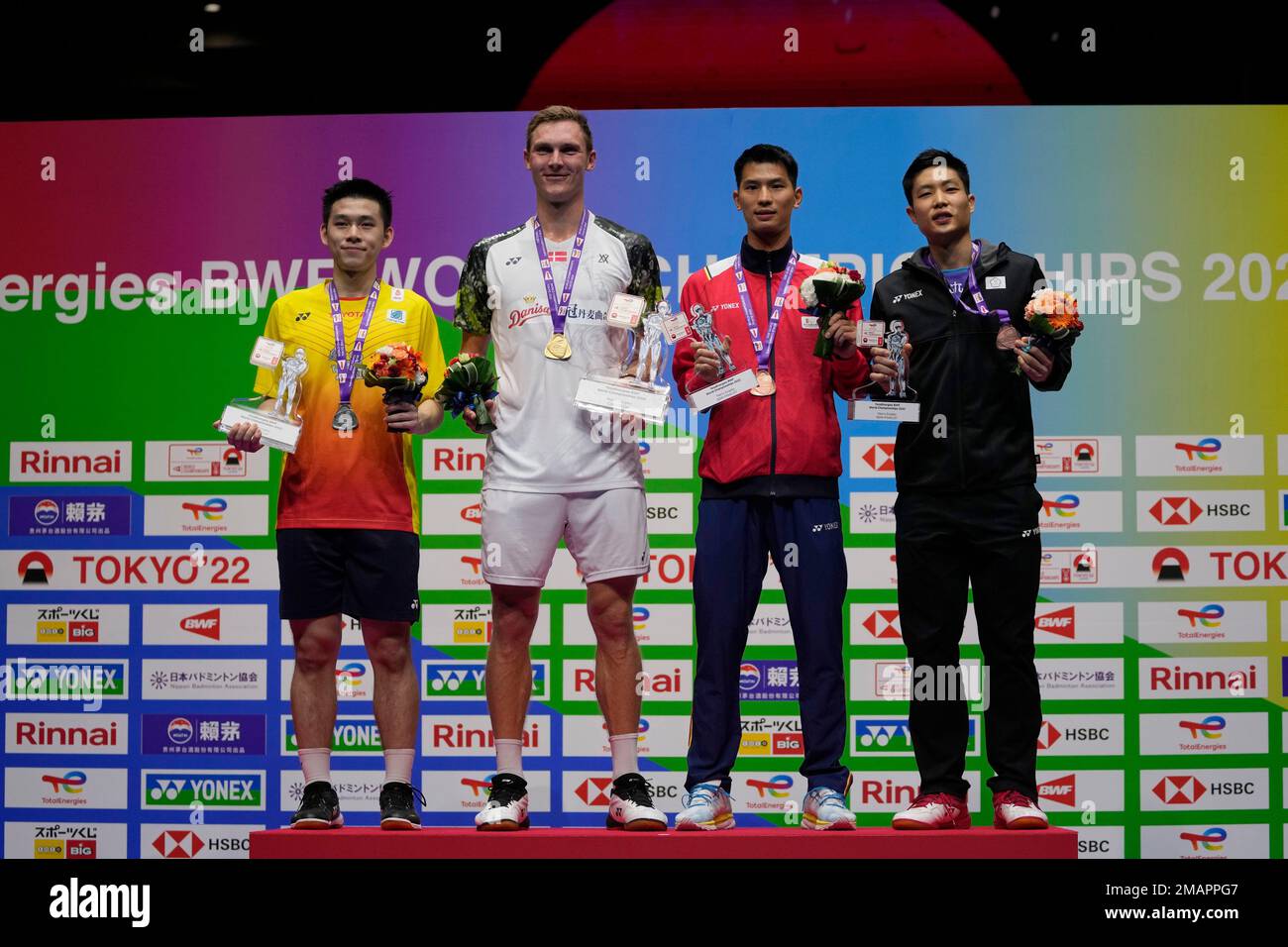 From left to right, silver medalist Thailand's Kunlavut Vitidsarn, gold ...