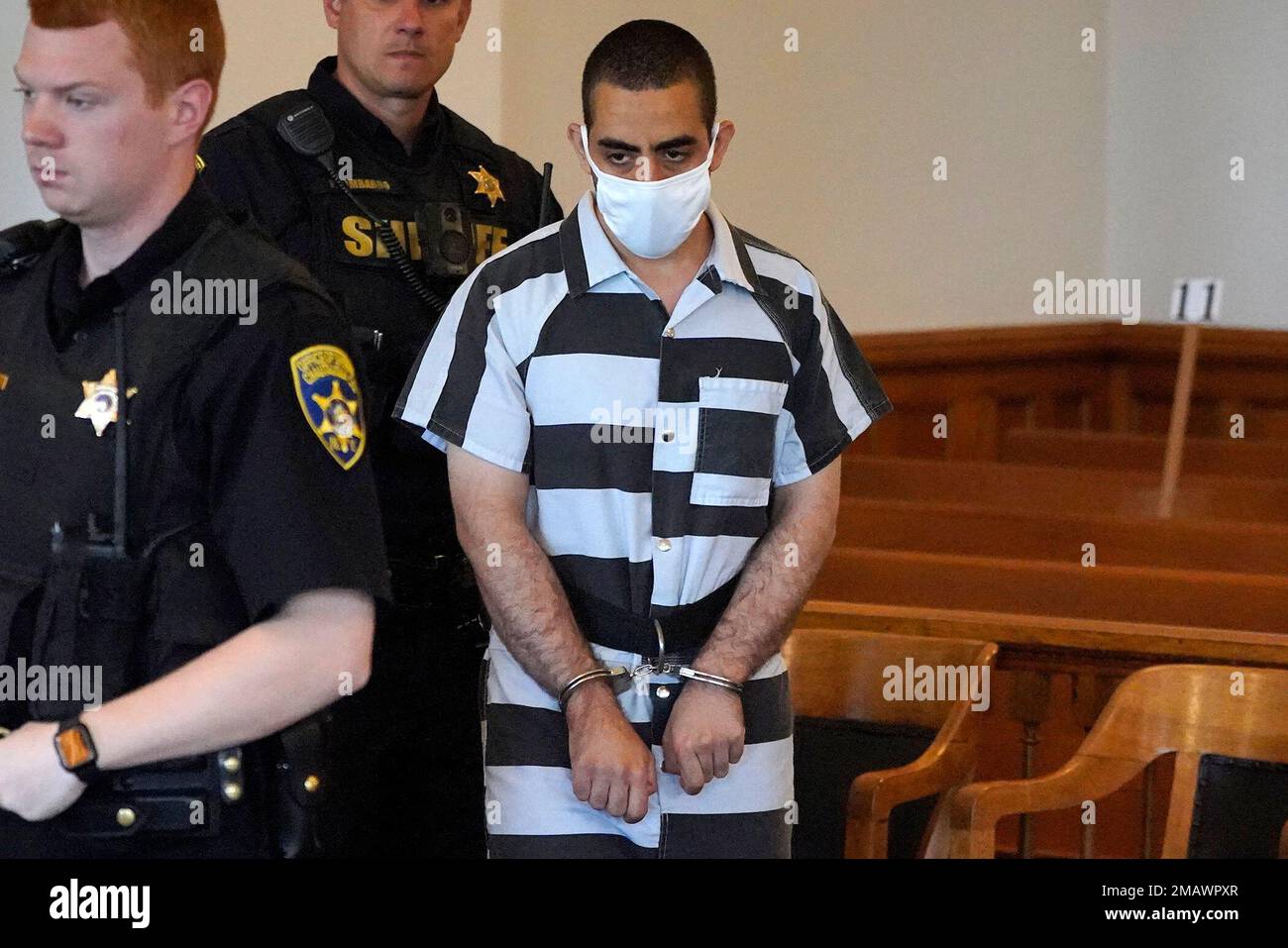 Hadi Matar, 24, center, arrives for an arraignment in the Chautauqua