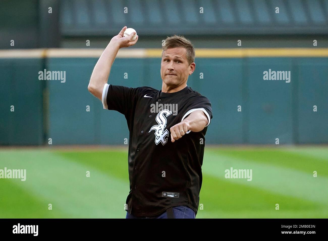 American DJ Kaskade, throws out a ceremonial first pitch before a