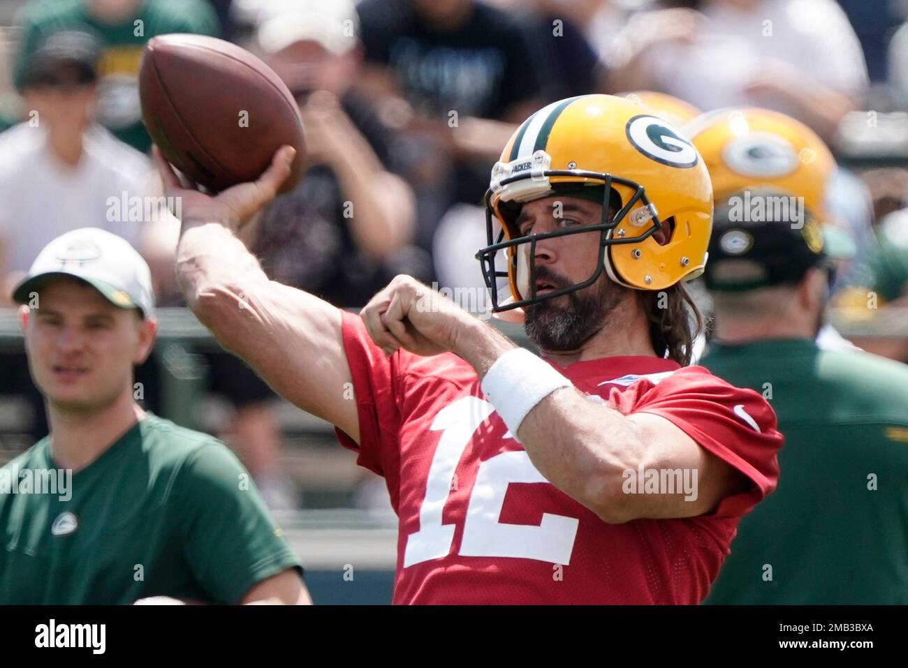 FILE Green Bay Packers' Aaron Rodgers runs a drill at the NFL