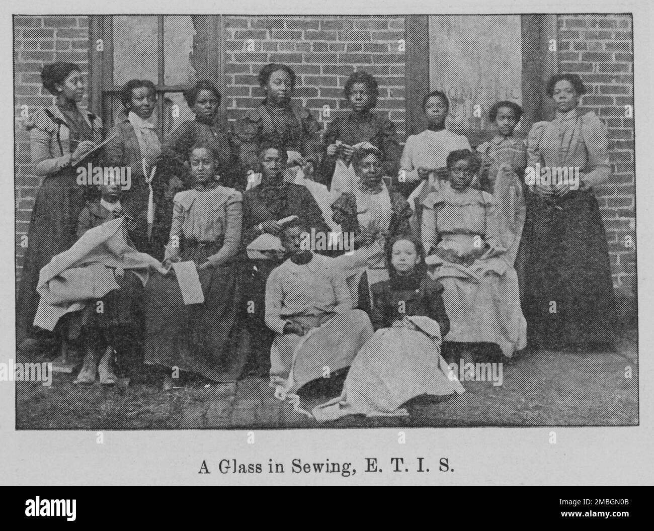 Eine Klasse in Nähen, E. T. I.. S., 1903. Stockfoto