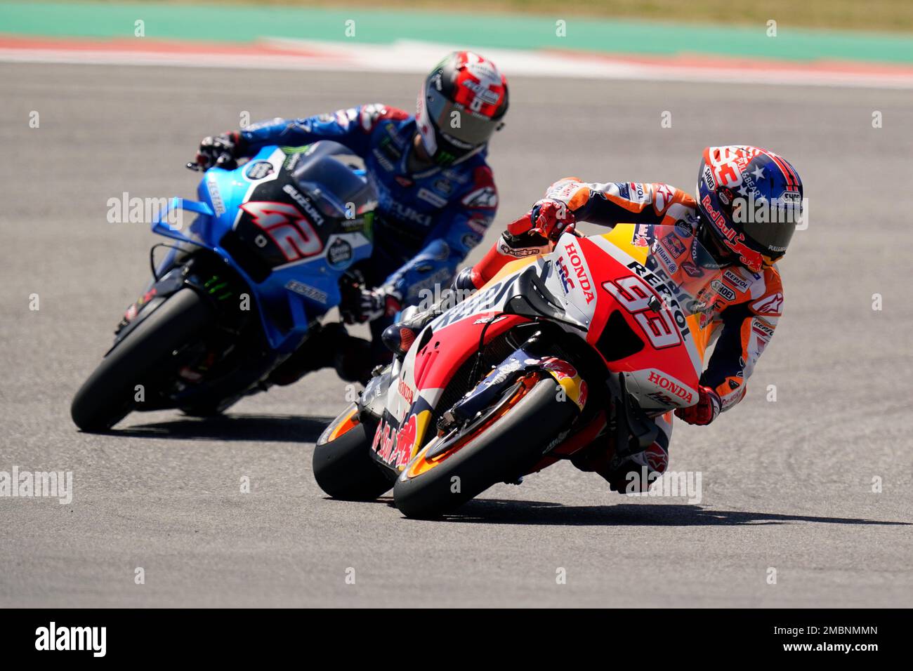 Marc Marquez (93), of Spain, leads Alex Rins (42), of Spain, through a turn  during qualifying for the MotoGP Grand Prix of the Americas motorcycle race  at the Circuit of the Americas,