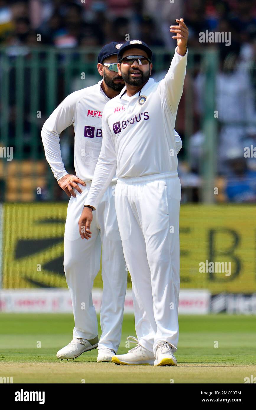 India's Virat Kohli, left, watches as captain Rohit Sharma gestures to ...
