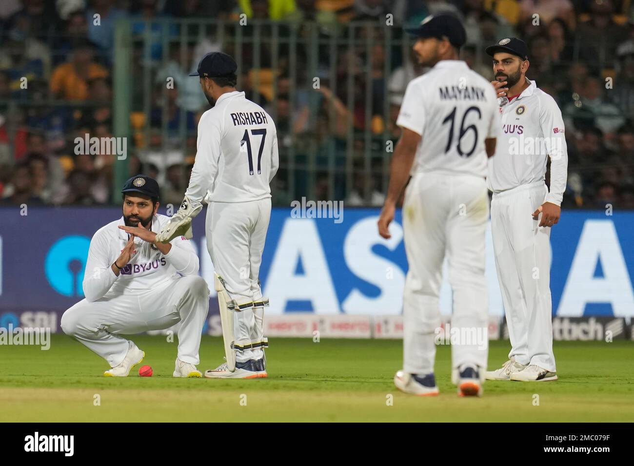 India's captain Rohit Sharma, left, gestures to ask for a review for ...