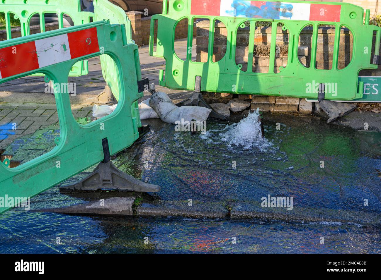 Berstwasserleitung, GB Stockfoto