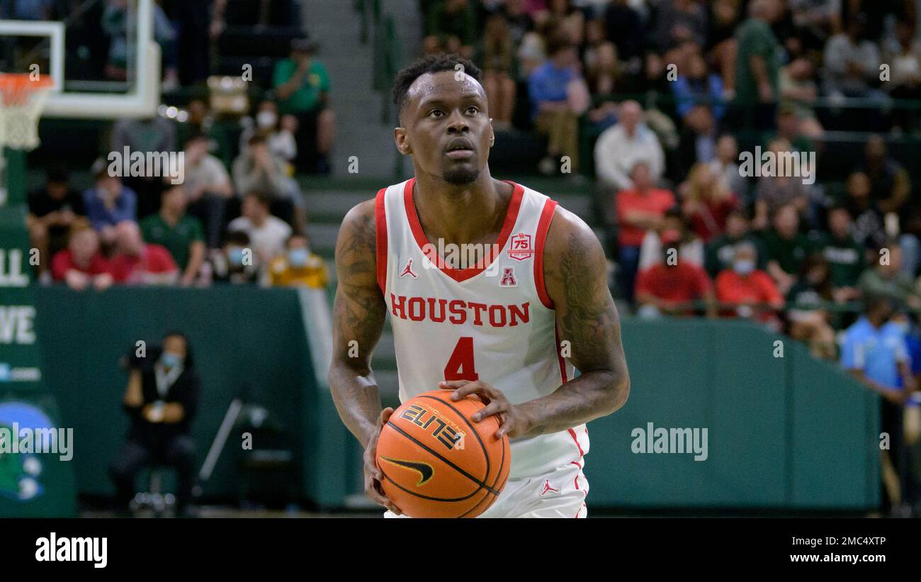 Houston guard Taze Moore (4) shoots during an NCAA college basketball game against Tulane in New Orleans, Wednesday, Feb. 23, 2022. (AP Photo/Matthew Hinton) Stockfoto