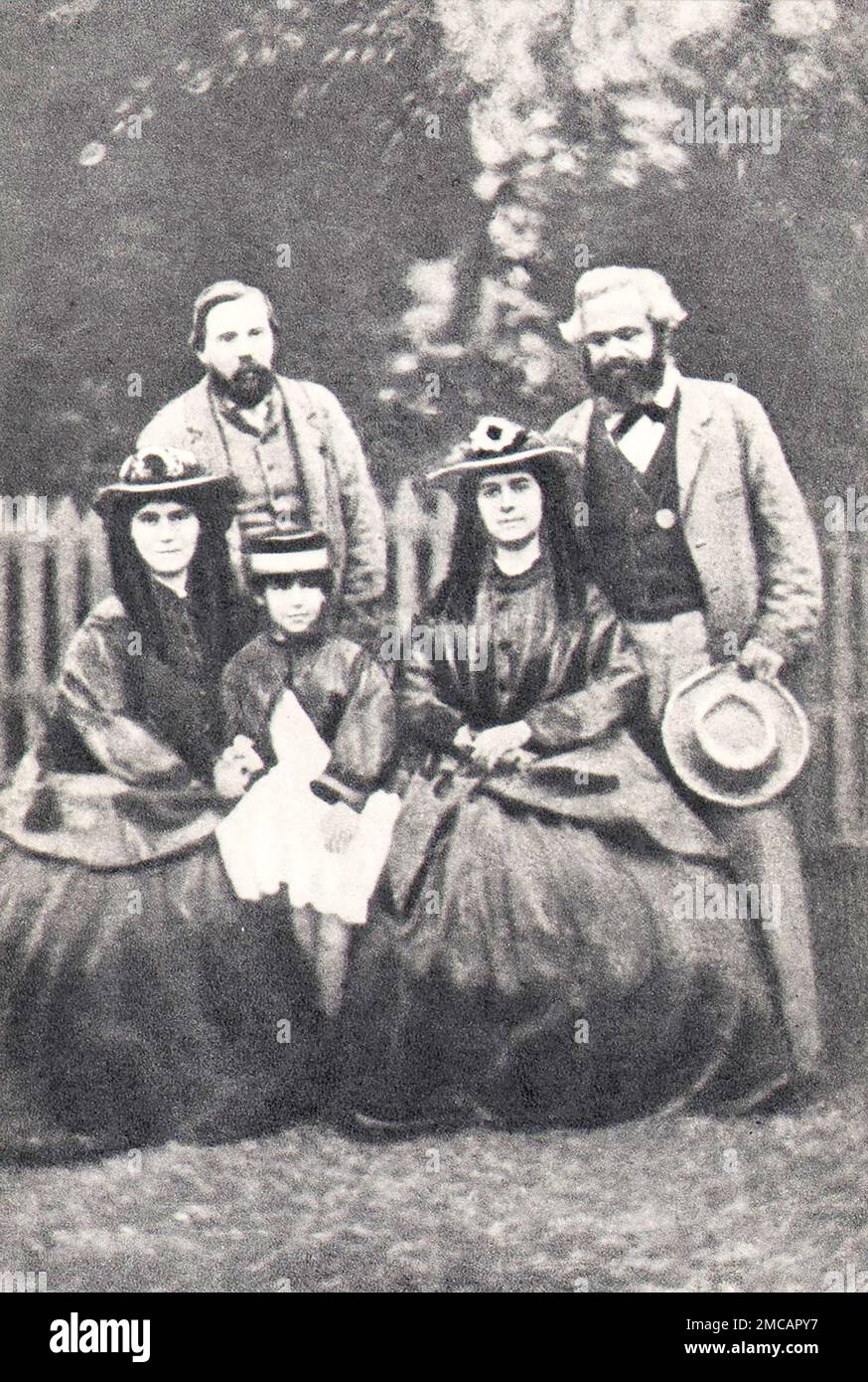 Karl Marx, Friedrich Engels und Karl Marx Töchter Eleanor und Laura. Foto von 1864. Stockfoto