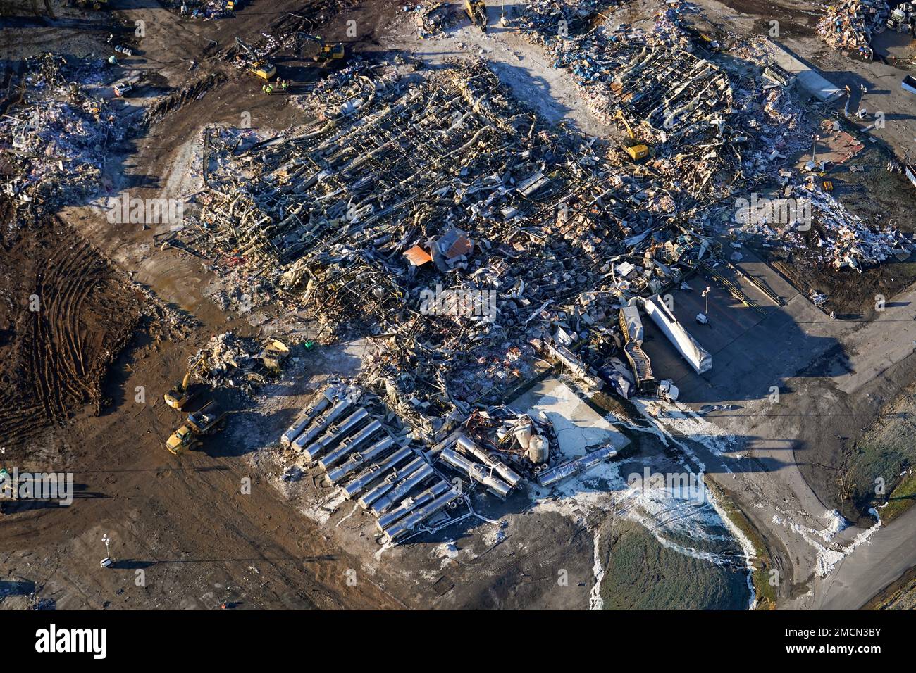 In this aerial photo, a collapsed factory is seen in Mayfield, Ky