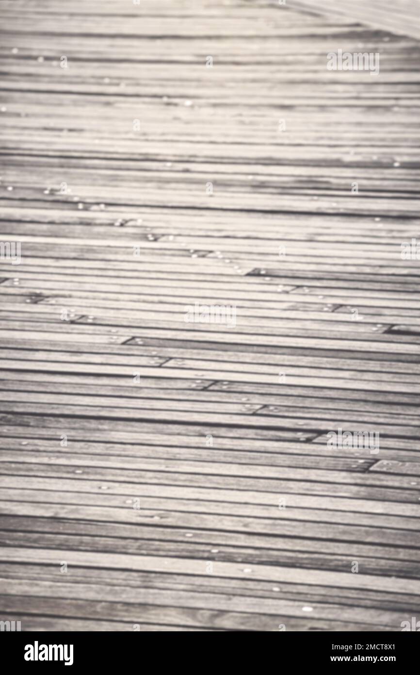 Verschwommenes Foto eines Holzbodens, abstrakter Hintergrund oder Tapete. Stockfoto