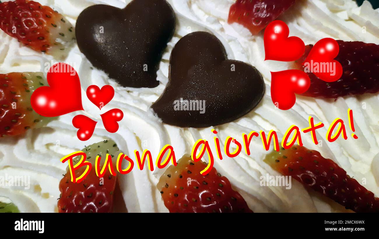 Guten Tag, Glück Zum Teilen. Cremes cake mit zwei Schokoladenherzen und vielen roten Herzen, Leidenschaft Liebe schrieb Guten Tag. Stockfoto