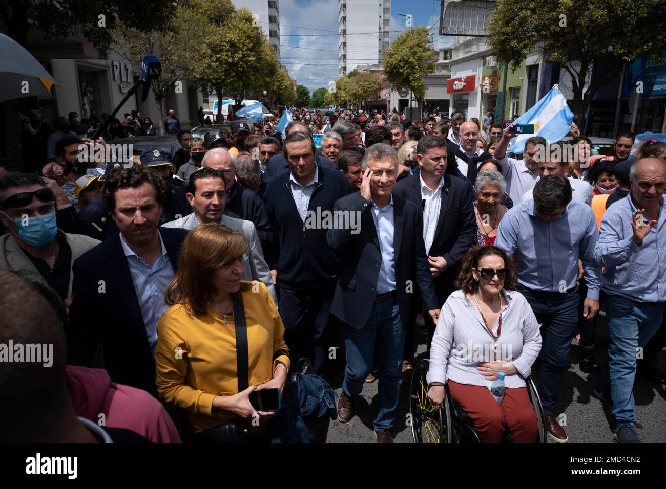 Former Argentine President Mauricio Macri, center, arrives to court