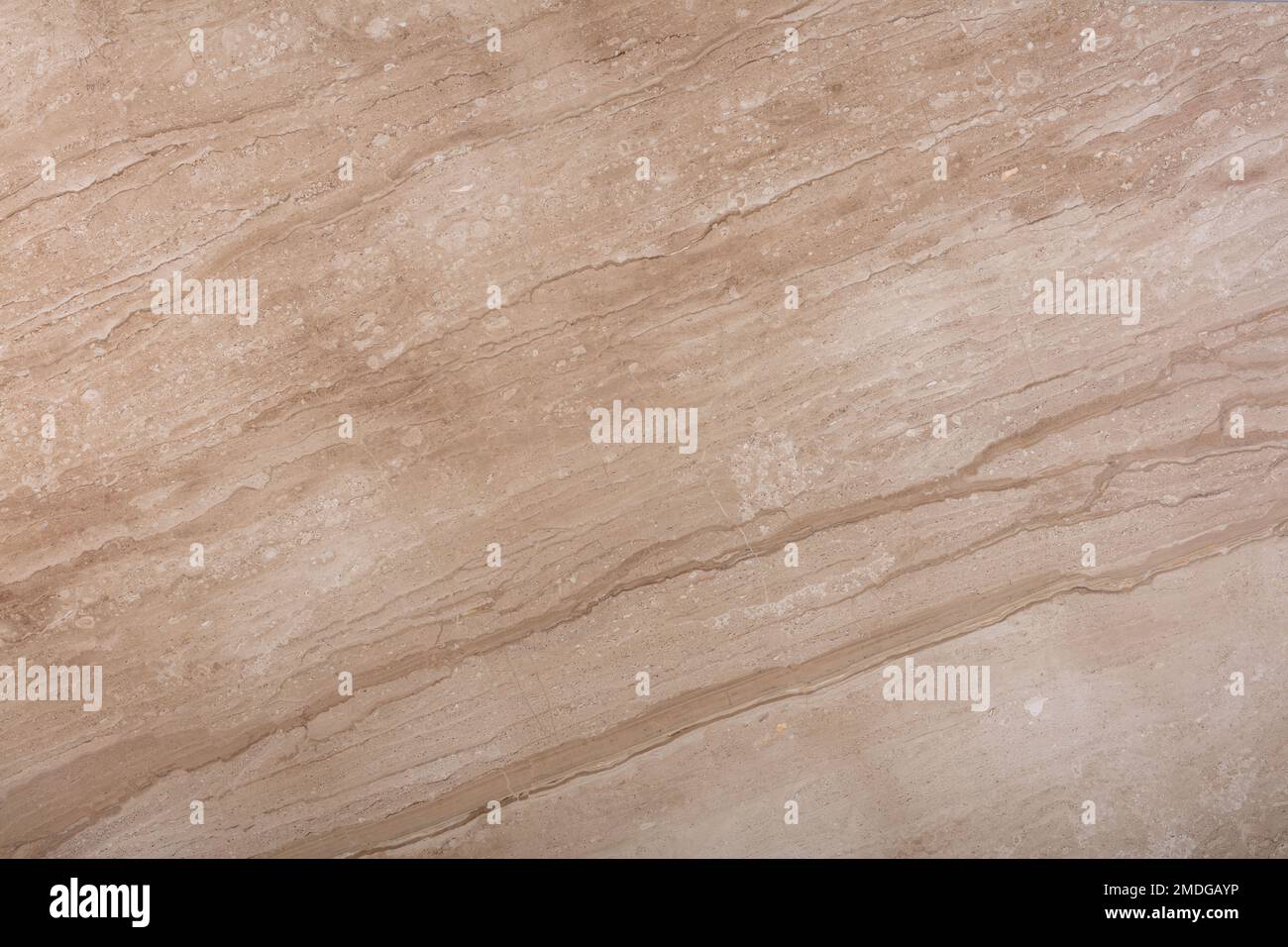 Daino reale natürliche Marmorsteinstruktur. Extra weiche beige natürliche Marmorsteinstruktur, Foto der Platte. Glänzendes beiges Granitmuster. Italienischer Stein Stockfoto