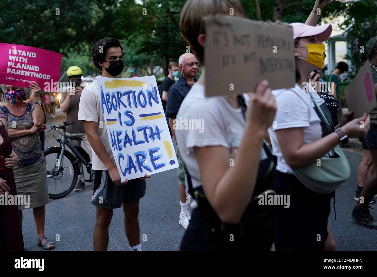 Protesters gather outside the home of Supreme Court Justice Brett