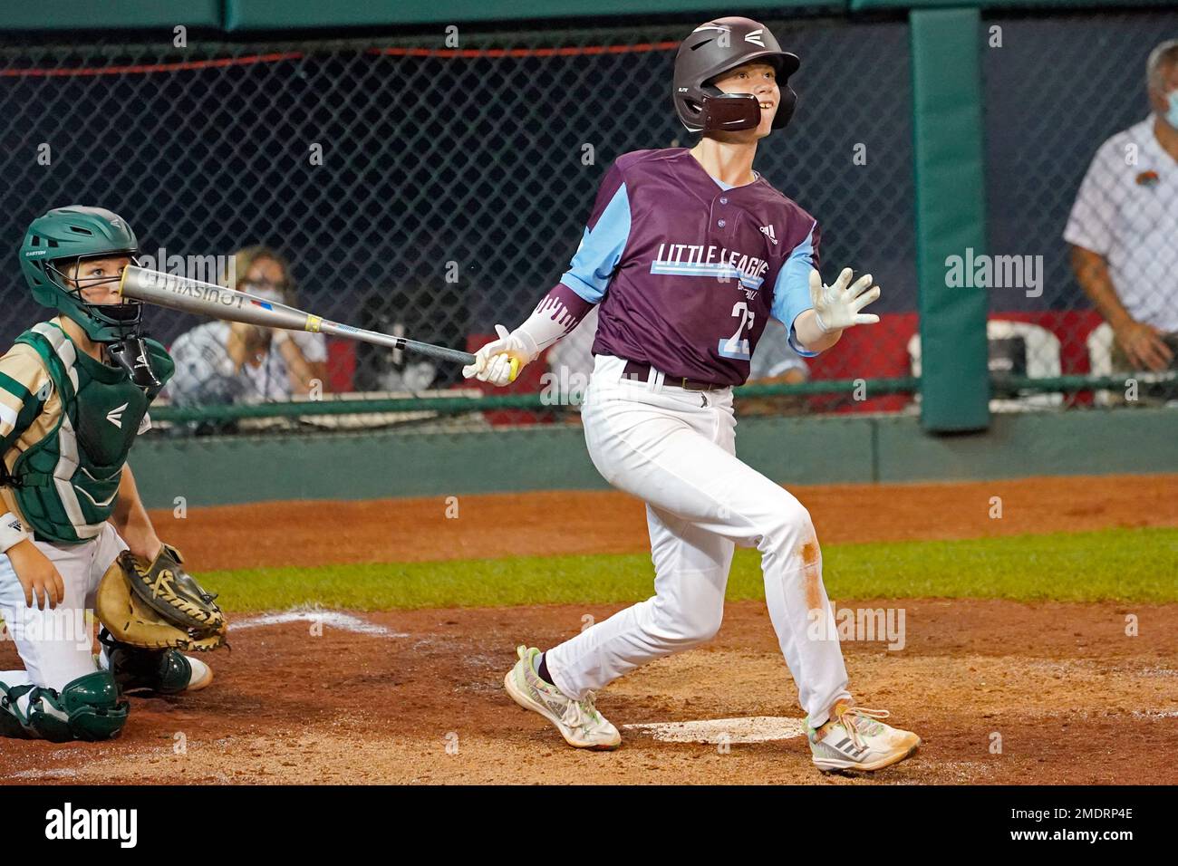 Hooksett, N.H.'s Calen Lucifer (23) watches his tworun home run off of