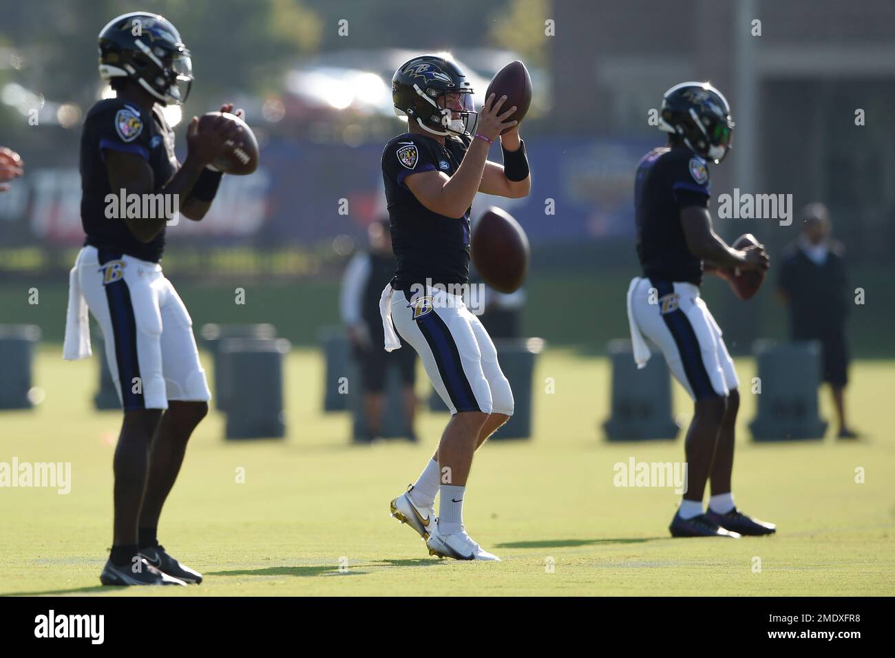 Baltimore Ravens quarterbacks, left to right, Tyler Huntley, Trace