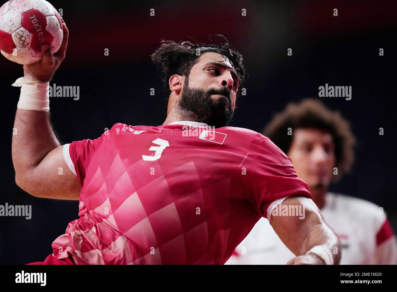 Bahrain's Ali Eid scores during the men's Preliminary Round Group B handball match between Egypt and Bahrain at the 2020 Summer Olympics, Sunday, Aug. 1, 2021, in Tokyo, Japan. (AP Photo/Pavel Golovkin) Stockfoto