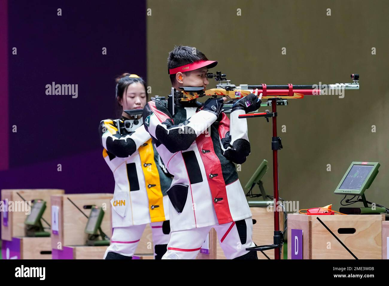 Yang Qian, left, and Yang Haoran, of China, compete in the mixed team ...