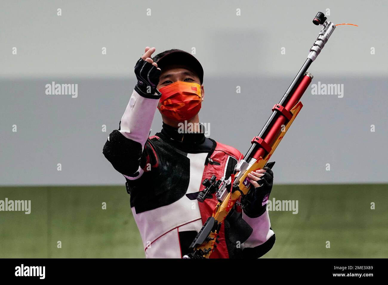Yang Haoran, of China, celebrates after competing in the mixed team 10 ...