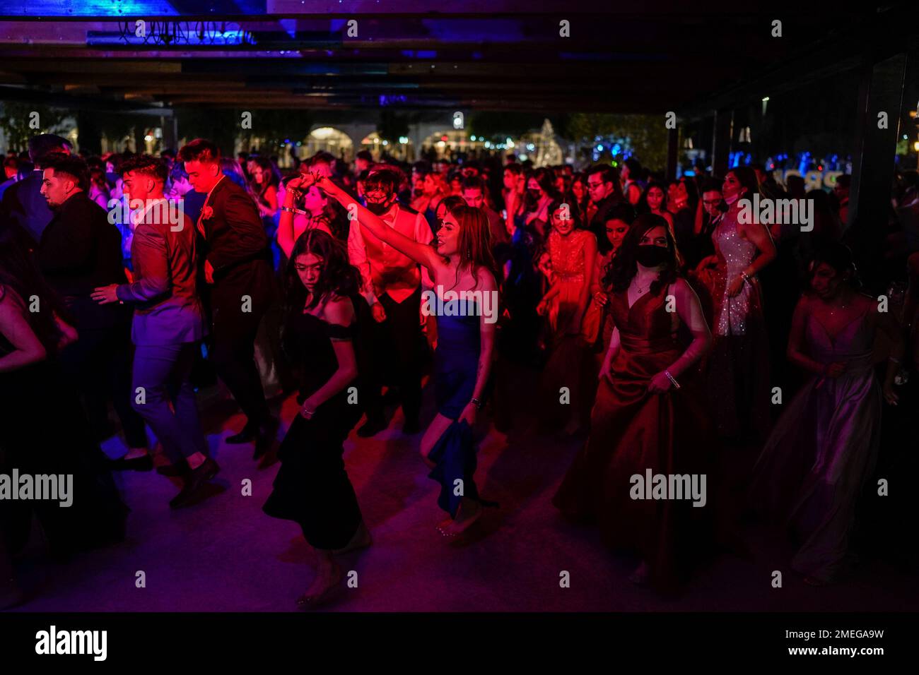 Young people attend prom at the Grace Gardens Event Center in El Paso