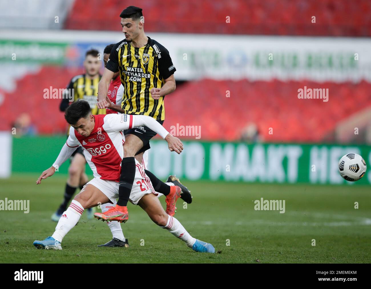 Vitesse's Armando Broja lands on the back of Ajax's Lisandro Martinez during the TOTO KNVB Cup final soccer match between Ajax and Vitesse at De Kuip stadium in Rotterdam, Netherlands, Sunday April 18, 2021. (AP Photo/Peter Dejong, Pool) Stockfoto