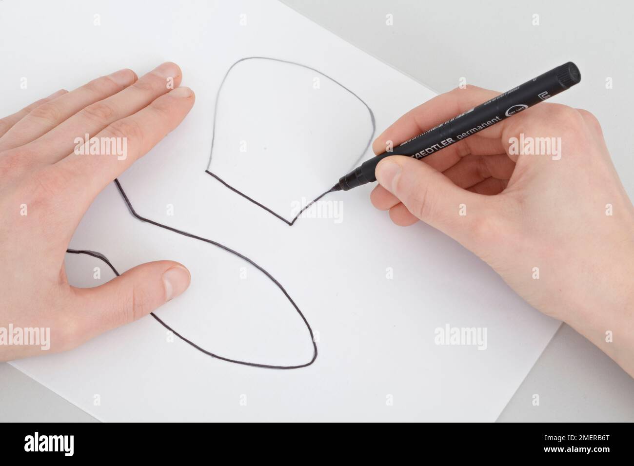 Schablonen umfahren, Spielzeugschmetterling Stockfoto