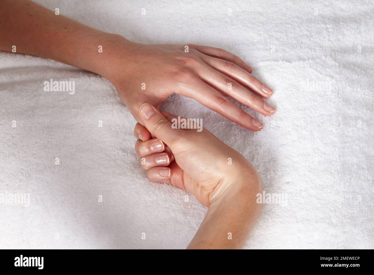 Hand-Massage-Greiffinger 2 Stockfoto