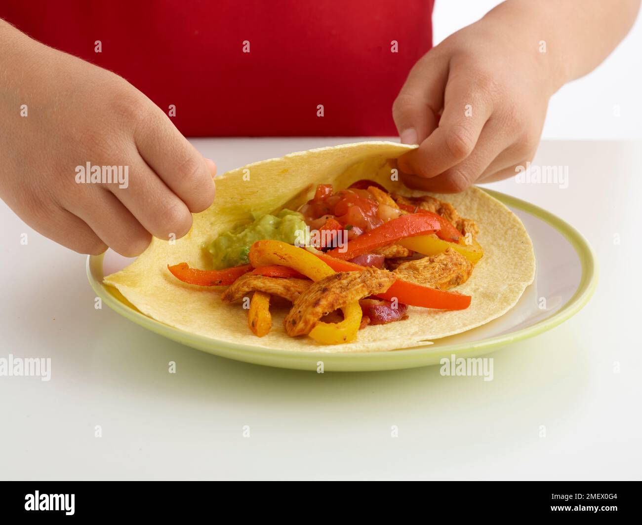 Schritte für Hühnerfajitas, Schritt 6 Stockfoto