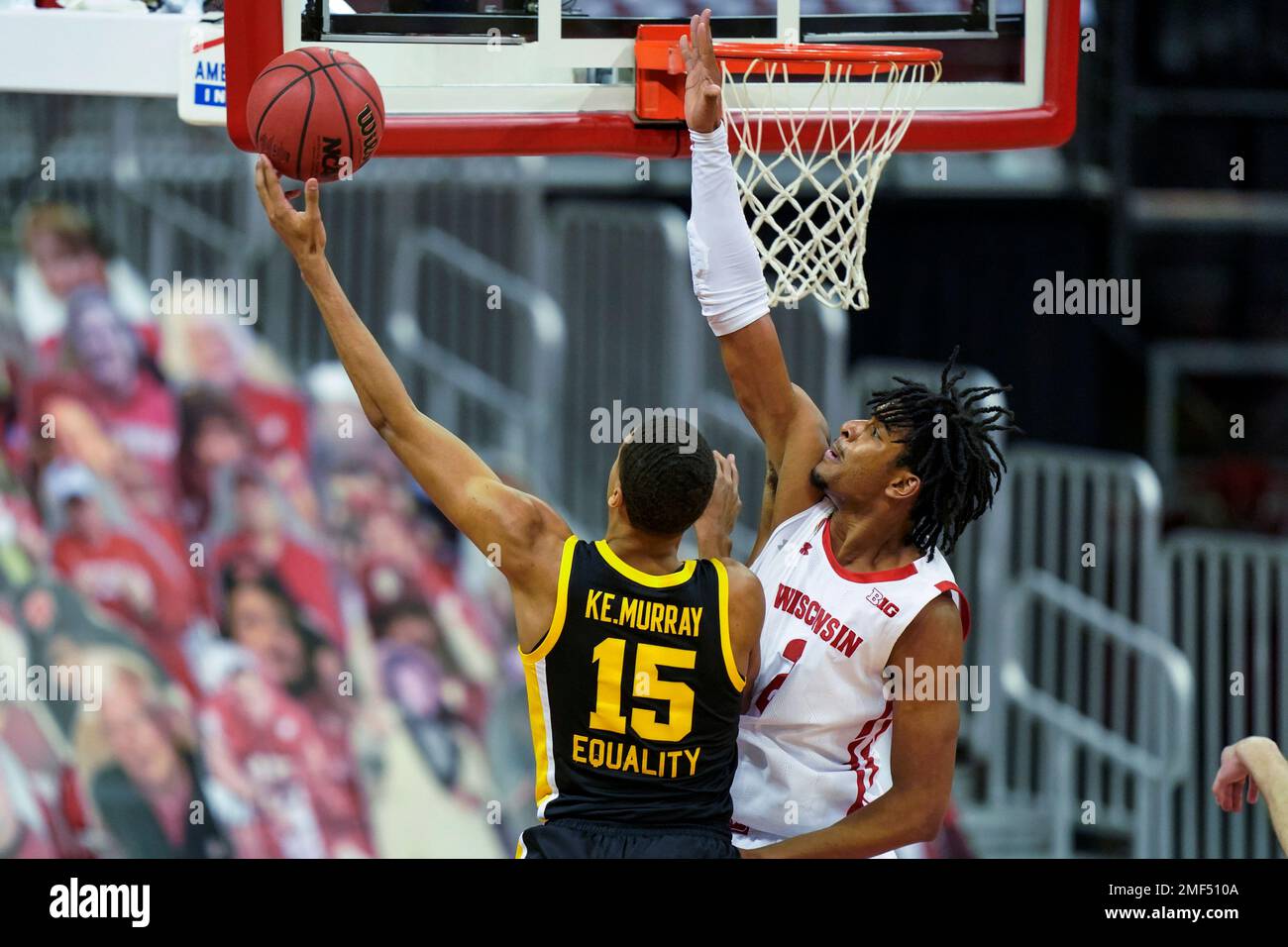 Iowa's Keegan Murray (15) shoots against Wisconsin's Aleem Ford during the second half of an NCAA college basketball game Thursday, Feb. 18, 2021, in Madison, Wis. (AP Photo/Andy Manis) Stockfoto