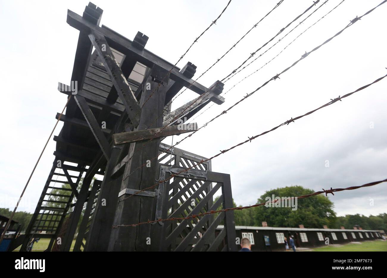 FILE - In this July 18, 2017 file photo, the wooden main gate leads into the former Nazi German Stutthof concentration camp in Sztutowo, Poland. (AP Photo/Czarek Sokolowski, file) Stockfoto