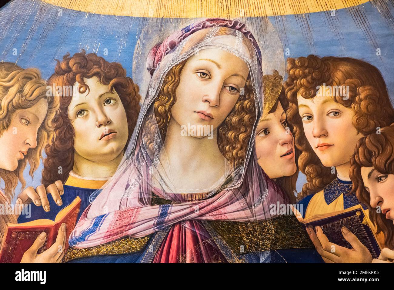 Detail des religiösen Gemäldes der Renaissance, das die Jungfrau Maria zeigt, umgeben von einer Gruppe von Jungen Stockfoto