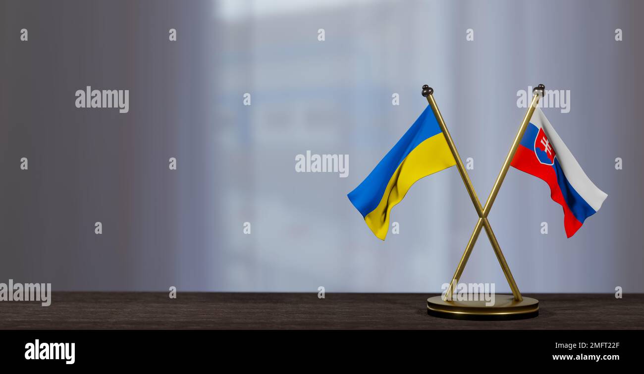 Flaggen der Ukraine und der Slowakei auf dem Tisch. Verhandlungen zwischen der Slowakei und der Ukraine. Auf wenig unscharfem Hintergrund. 3D Arbeit und 3D Bild Stockfoto