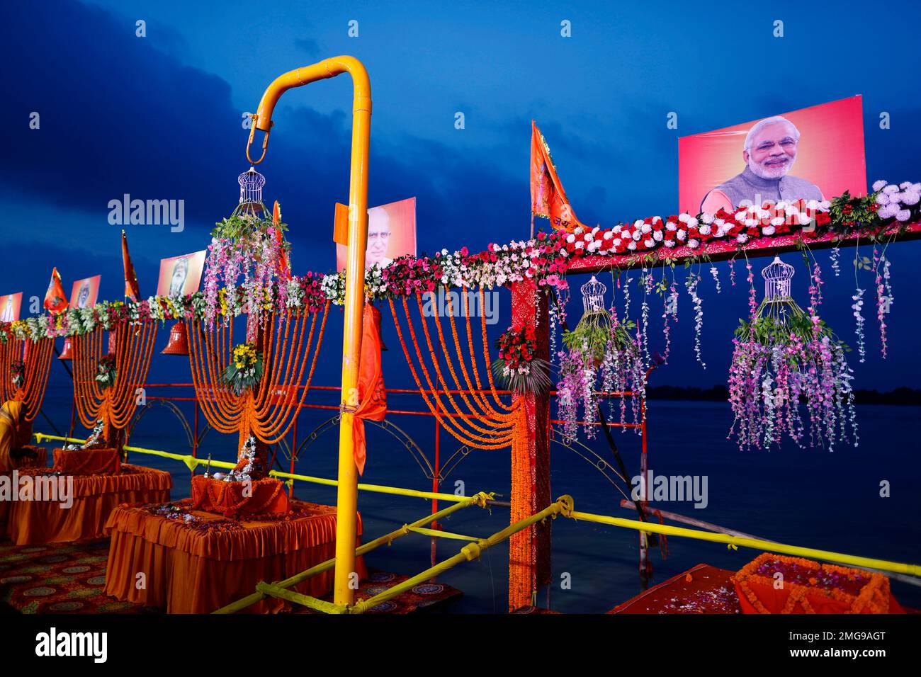 A photo of Indian Prime Minister Narendra Modi, right, along with other ...