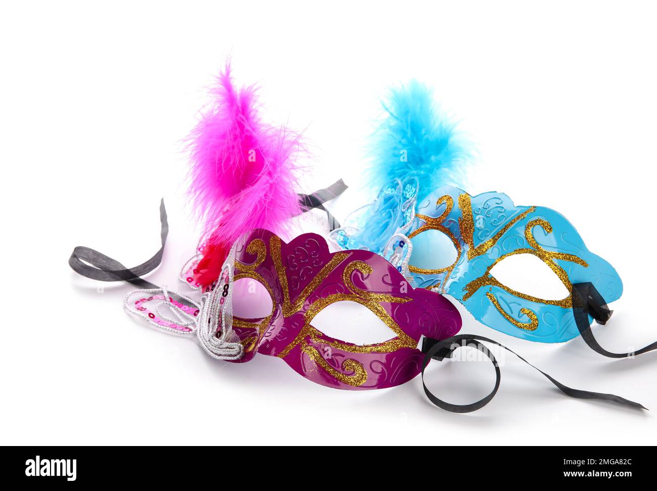 Wunderschöne Karnevalsmasken für die Mardi Gras Feier auf weißem Hintergrund Stockfoto