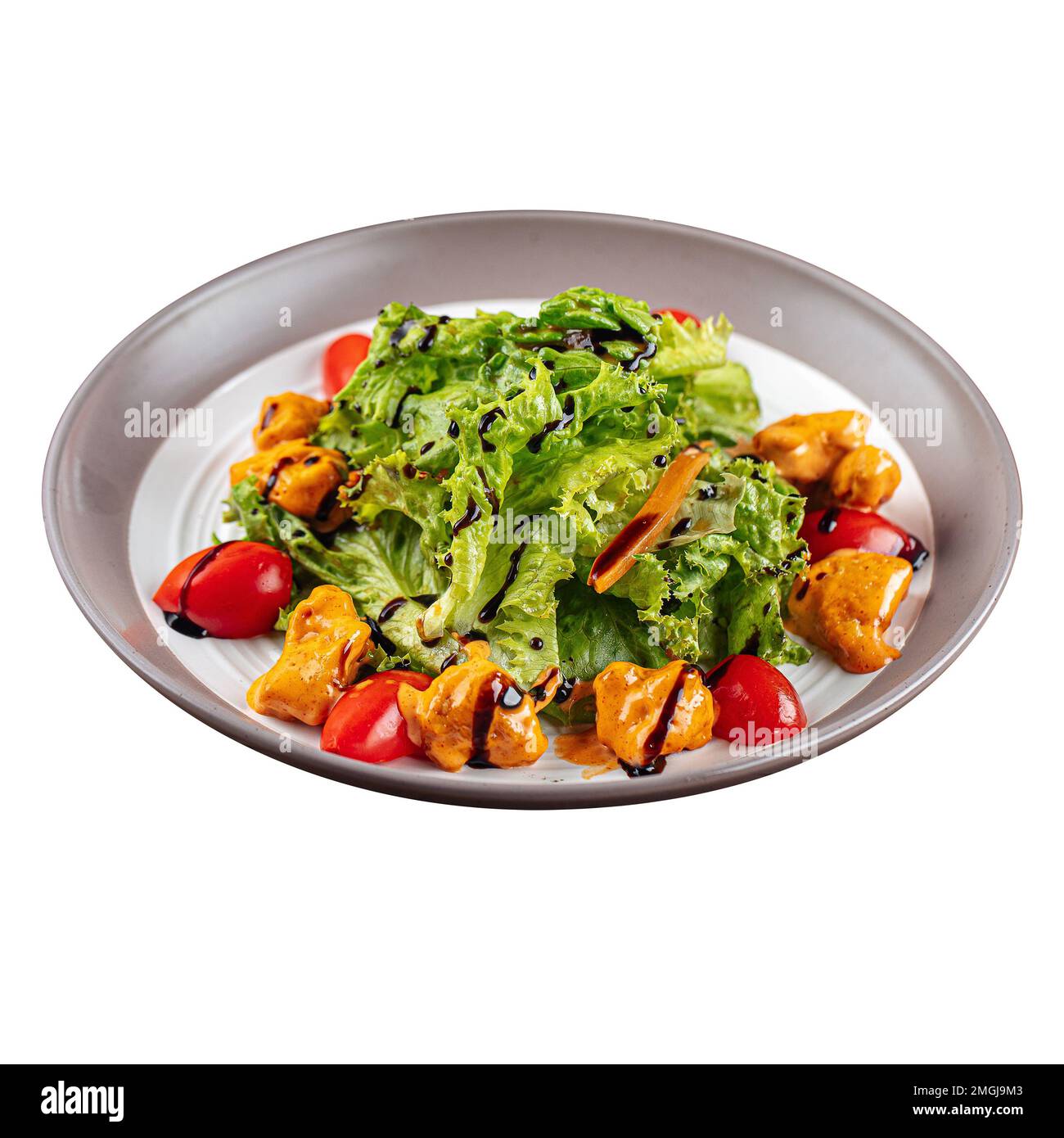 Portion Salat mit Salat und gebratenem Hähnchen Stockfoto