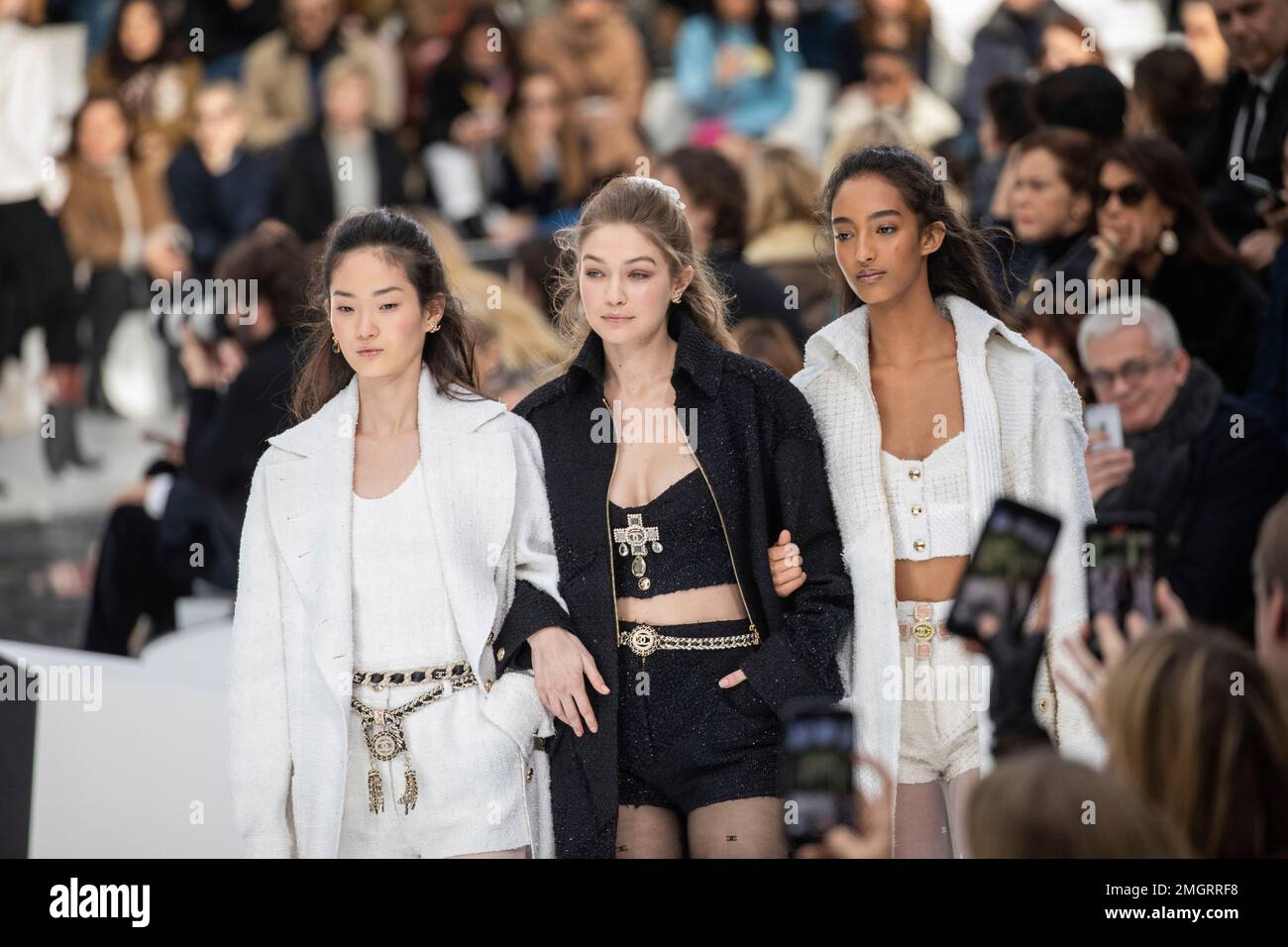Model Gigi Hadid, centre, walks with other models as they wear creations for the Chanel fashion collection during Women's fashion week Fall/Winter 2020/21 presented in Paris, Tuesday, March 3, 2020. (Photo by Vianney Le Caer/Invision/AP) Stockfoto