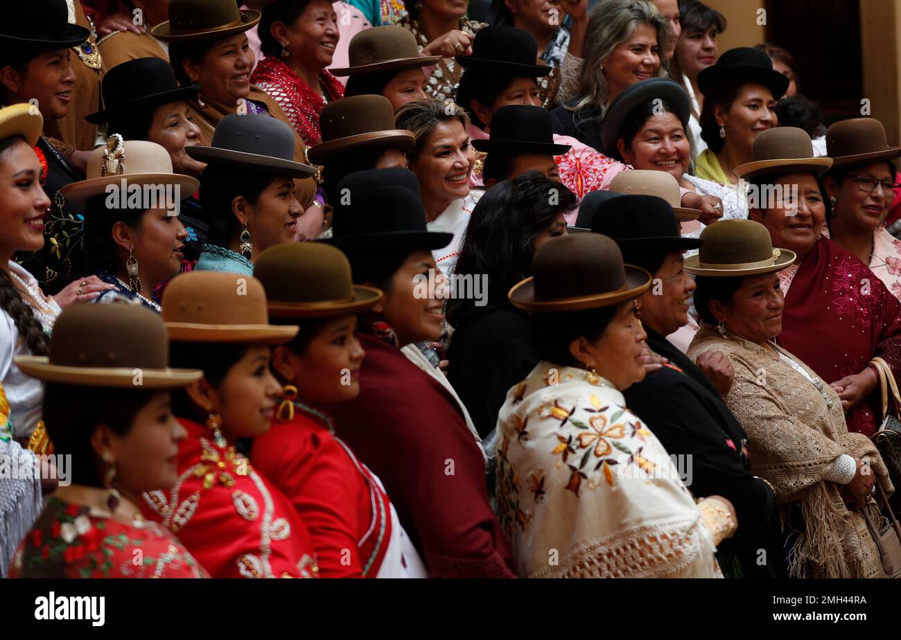 Indigenous women known as "Cholas" surround Bolivia's interim President
