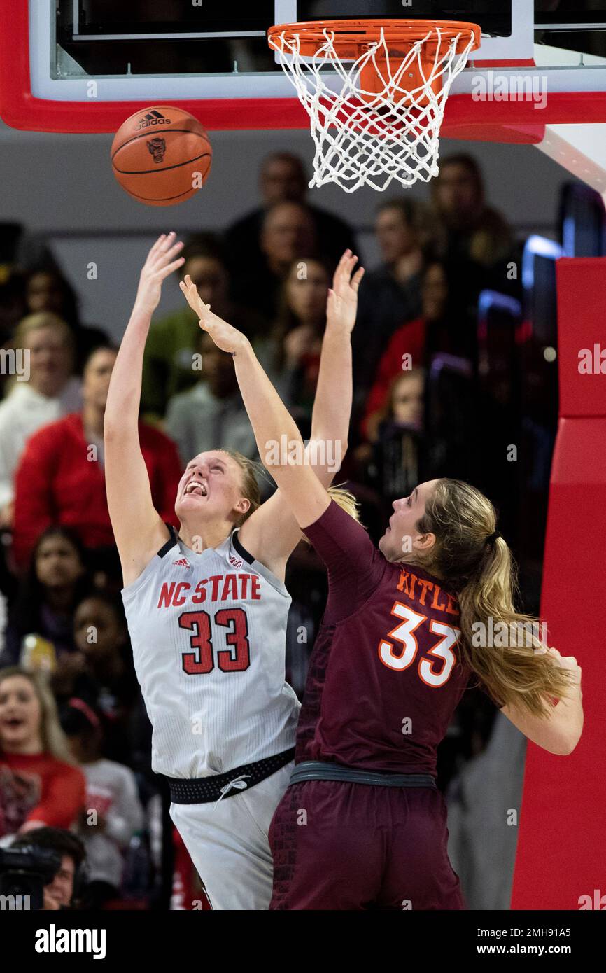 North Carolina State's Elissa Cunane, left, attempts a shot over Virginia Tech's Elizabeth Kitley, right, during an NCAA college basketball game in Raleigh, N.C., Thursday, Jan. 2, 2020. (AP Photo/Ben McKeown) Stockfoto