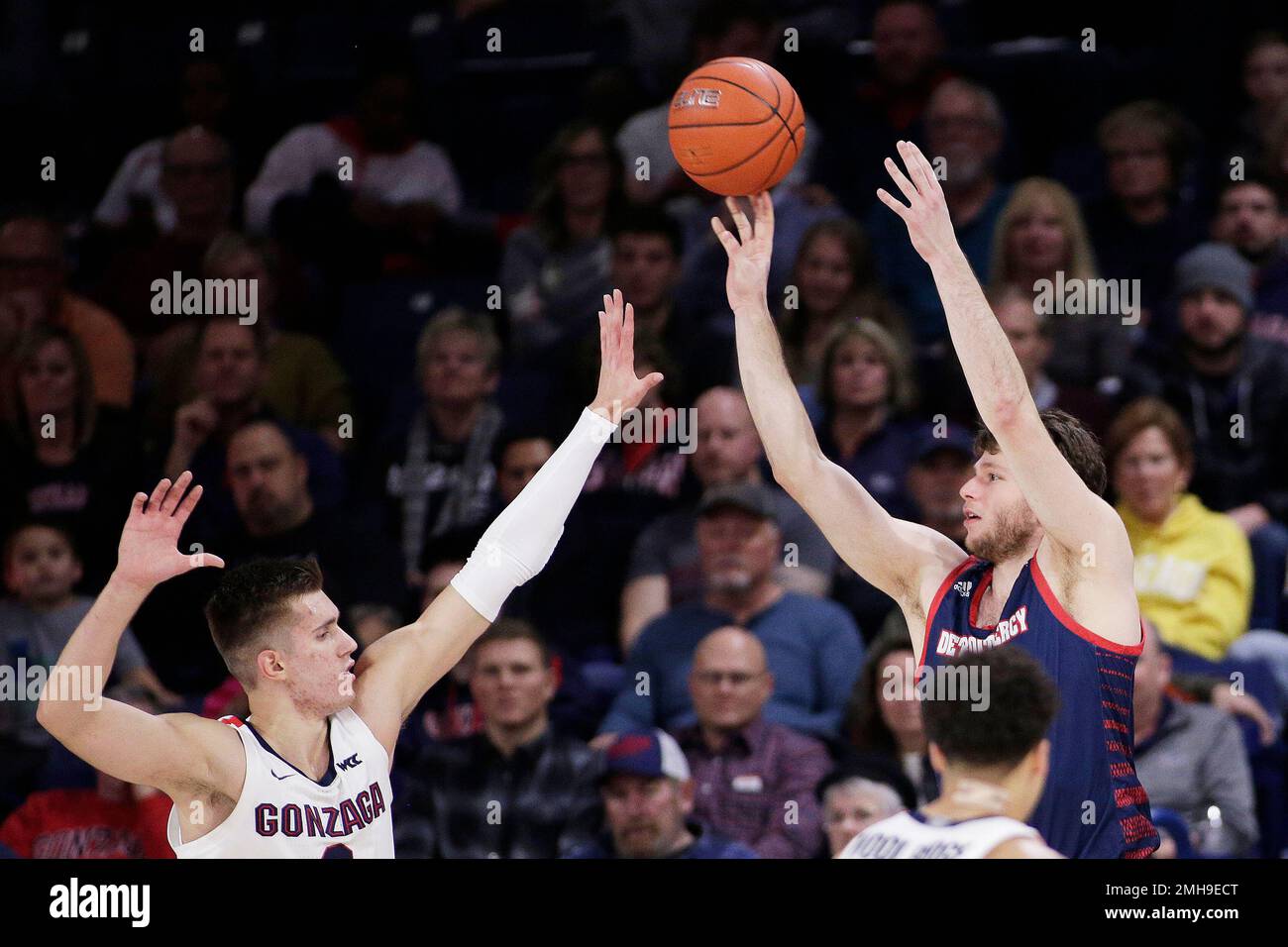 Detroit Mercy forward Willy Isiani, right, shoots over Gonzaga forward Filip Petrusev during the