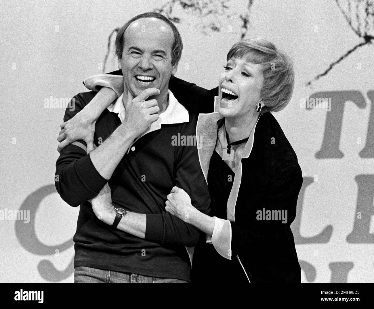 Comedian Carol Burnett laughs with co-star Tim Conway during the taping ...