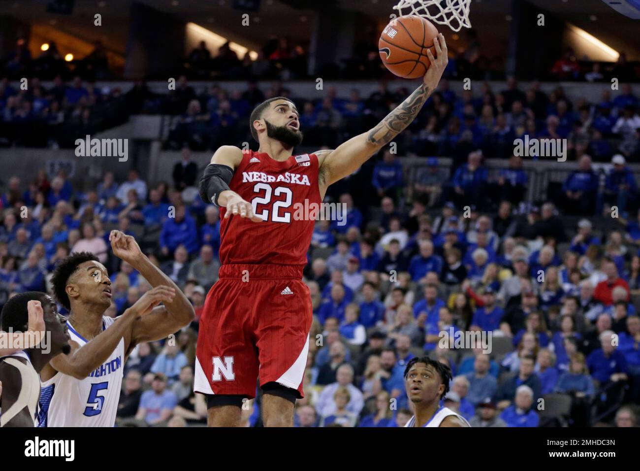 Nebraska's Haanif Cheatham (22) goes for a layup against Creighton's Ty