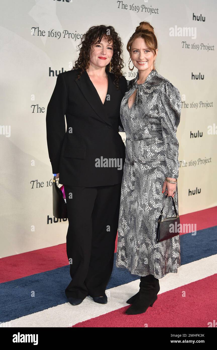 Caitlin Roper, left, and Kathleen Lingo arrive at the premiere of
