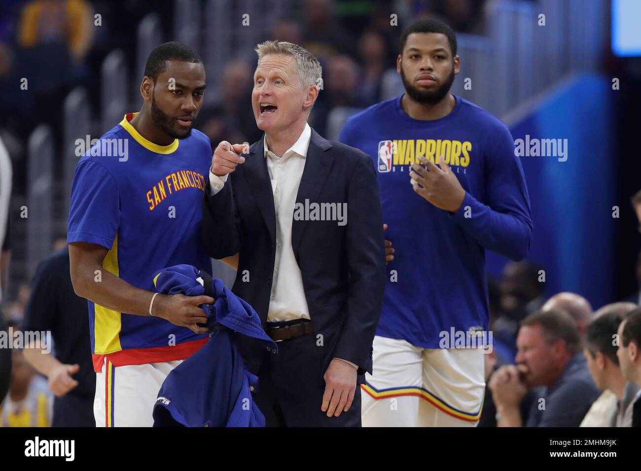 Golden State Warriors head coach Steve Kerr, center, gestures between