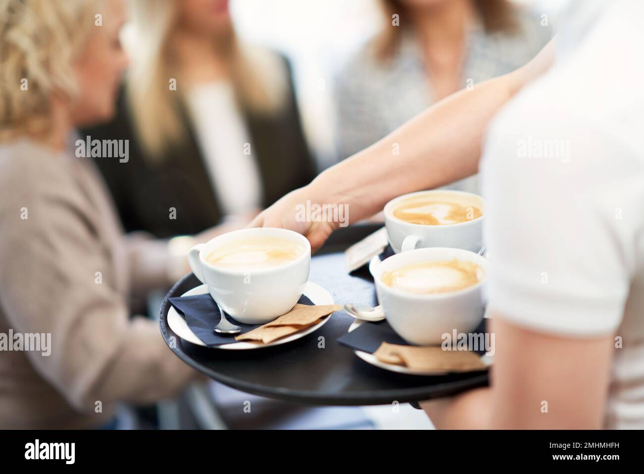 Bild eines Kaffees bei einem Geschäftstreffen im Restaurant. Stockfoto
